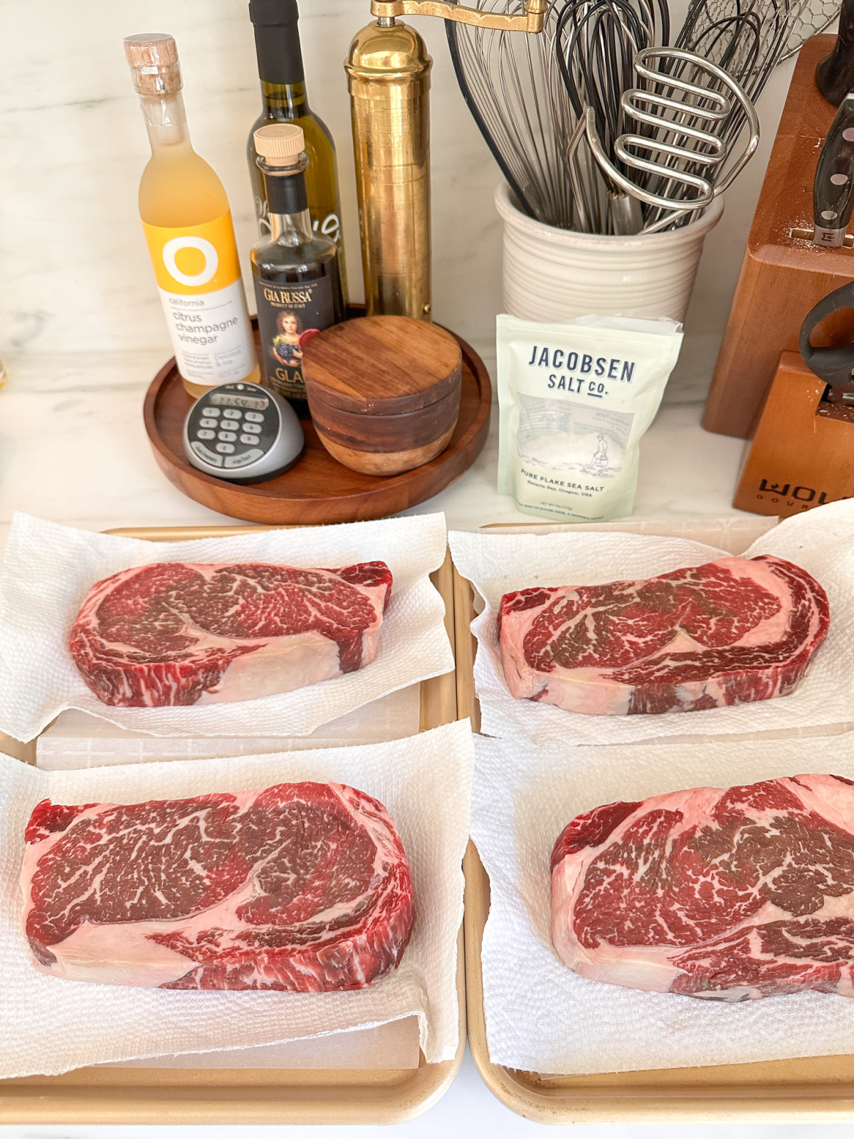 Rib Eye steaks resting on counter.