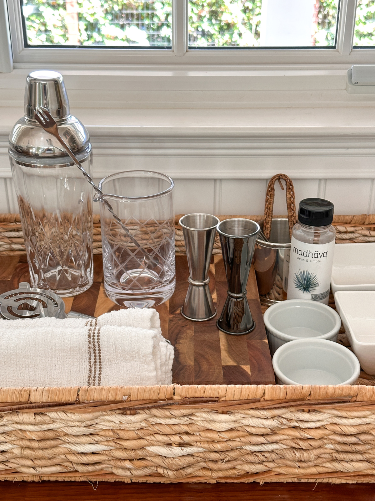 Cocktail prep in woven tray.