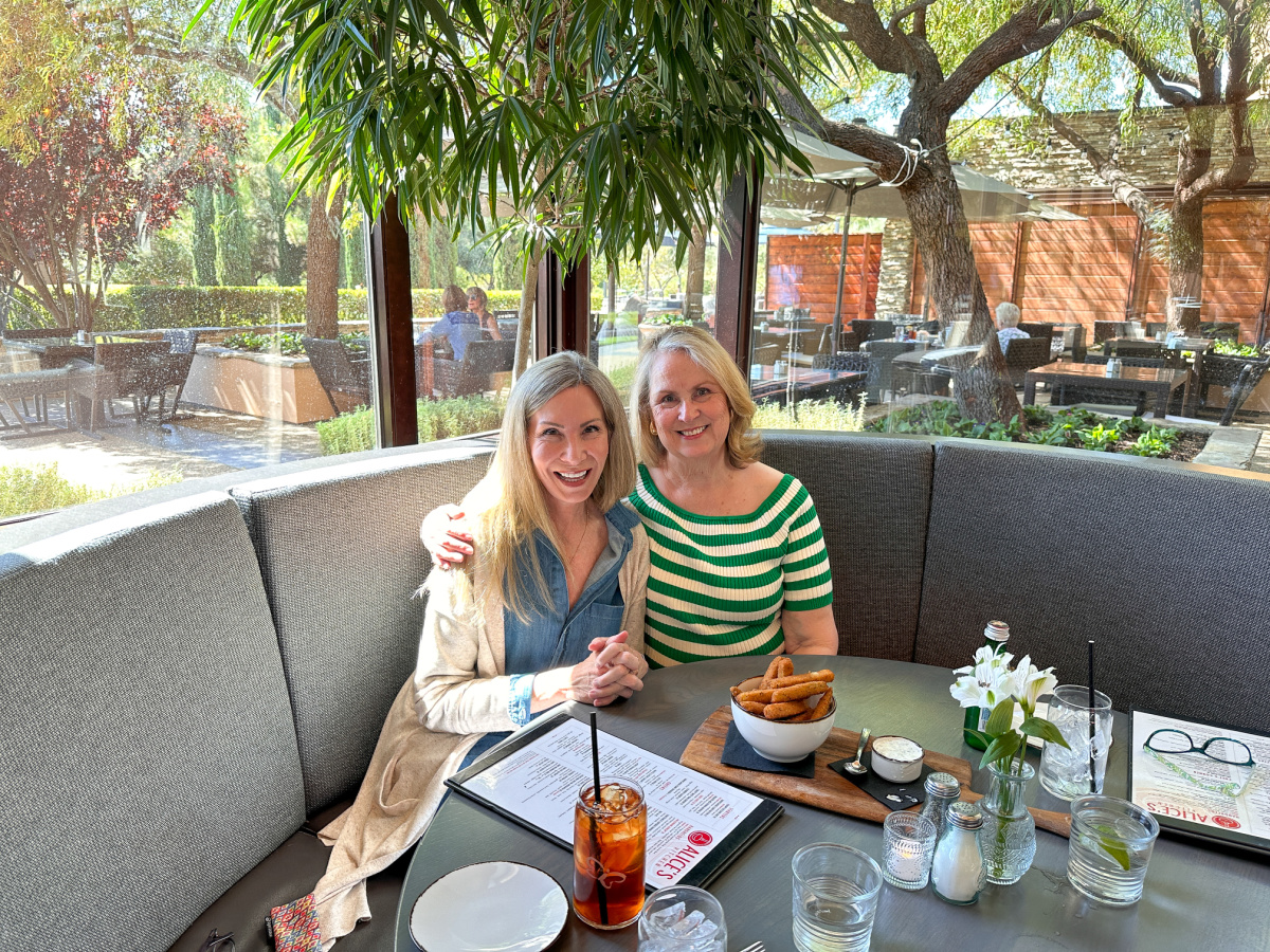 Two women in lunch booth.