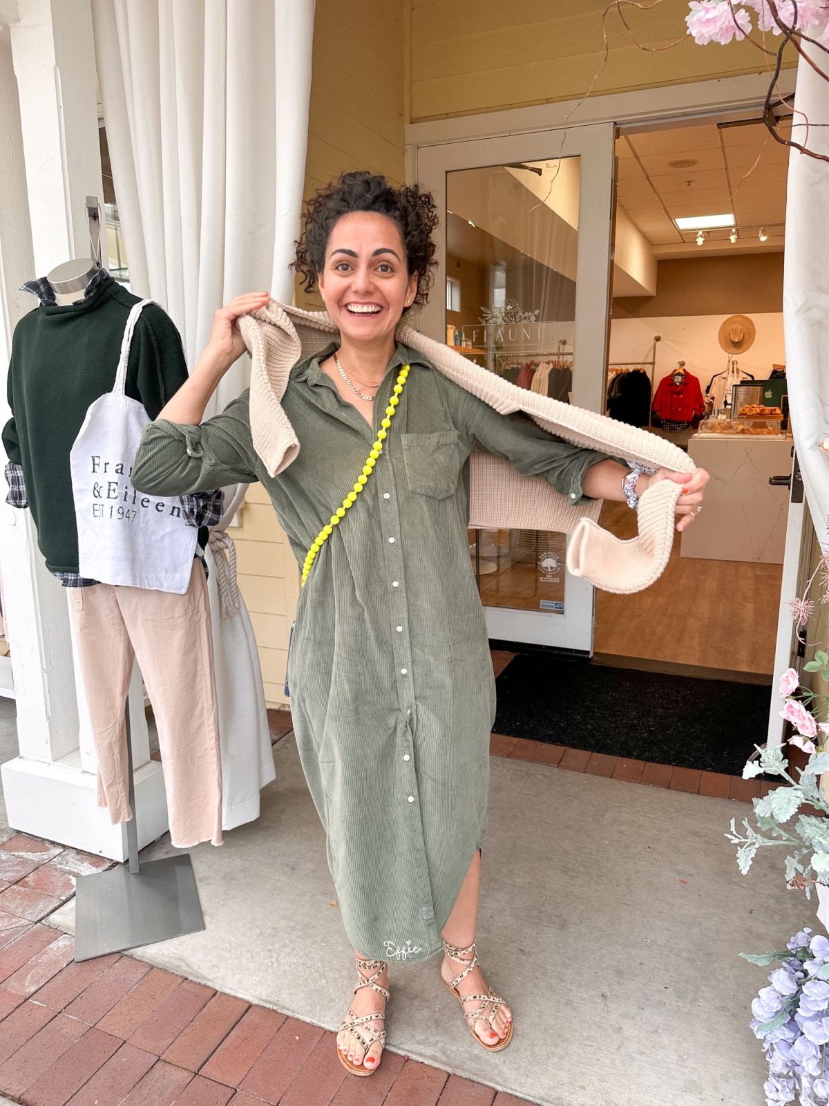 Frank & Eileen brand ambassador wearing green corduroy shirt dress.
