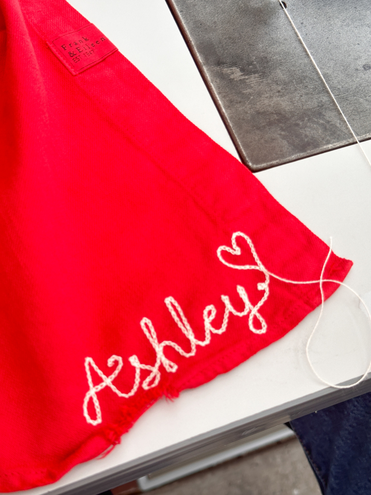 Embroidered shirt hem.