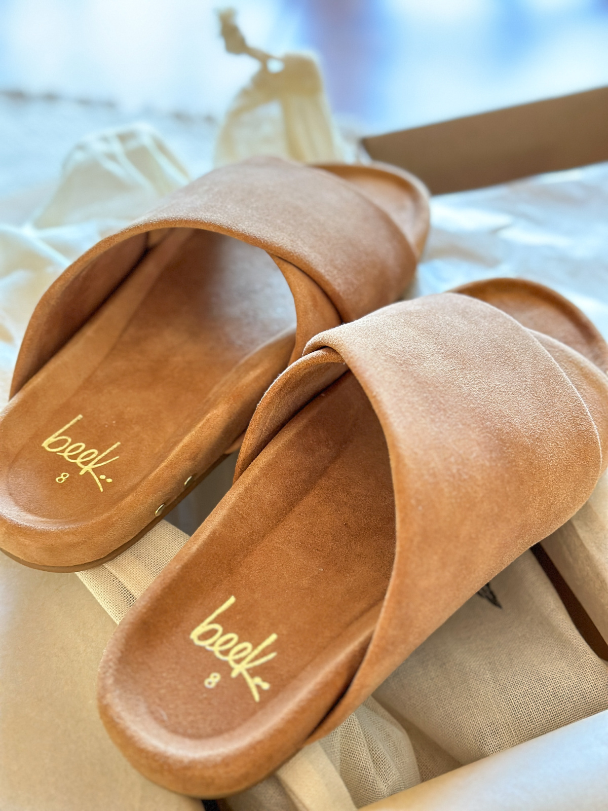 Beek suede slides.