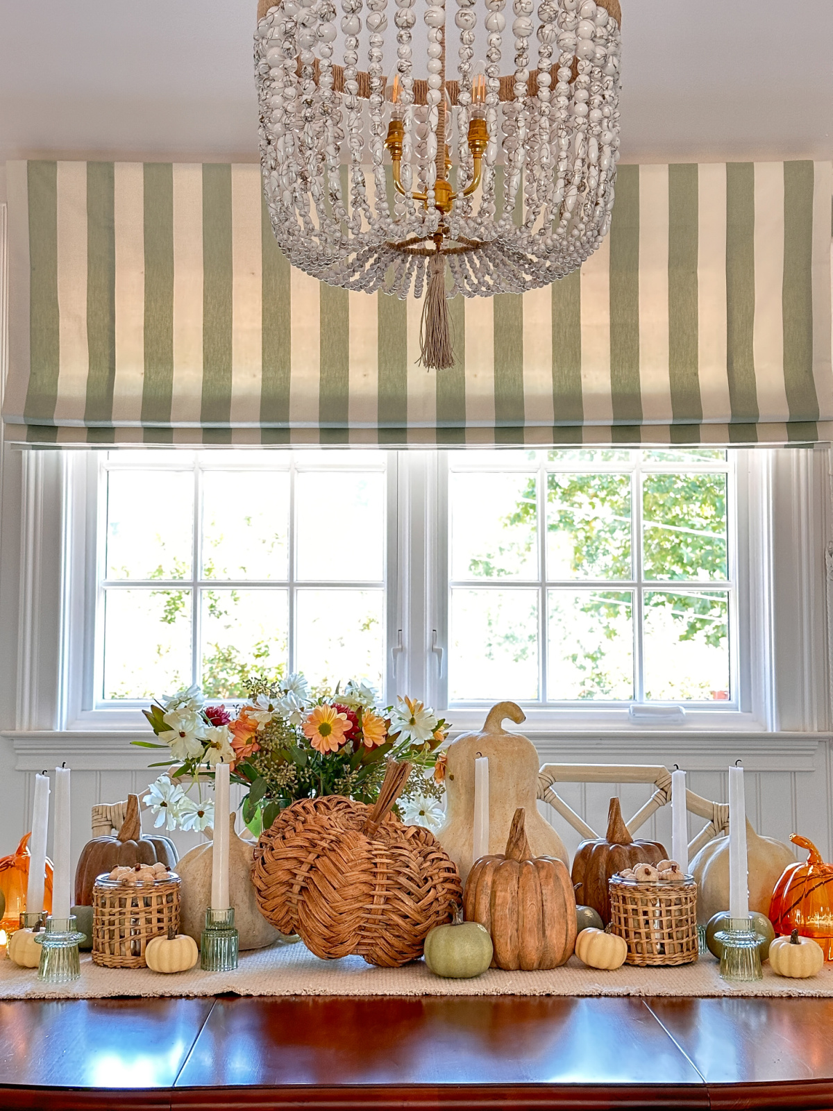 Fall centerpiece on dining table.