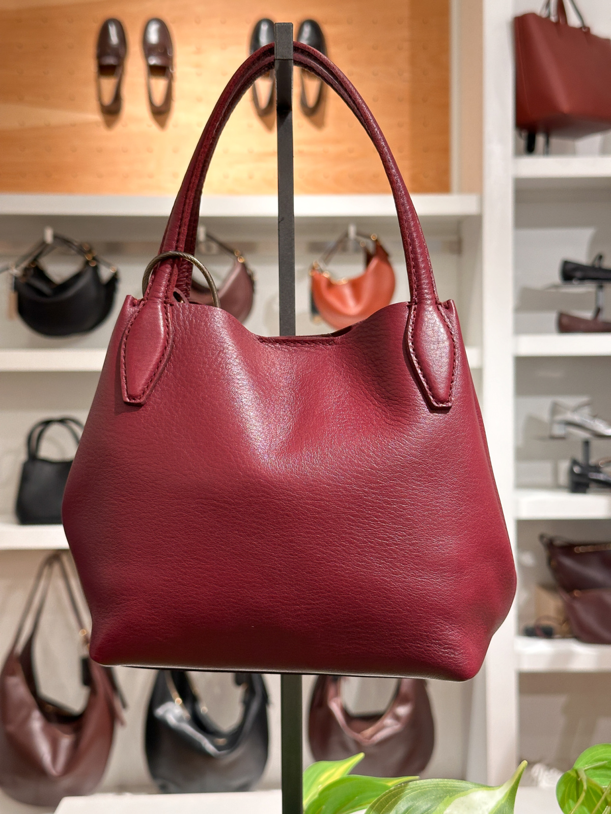 Burgundy bag at Madewell.
