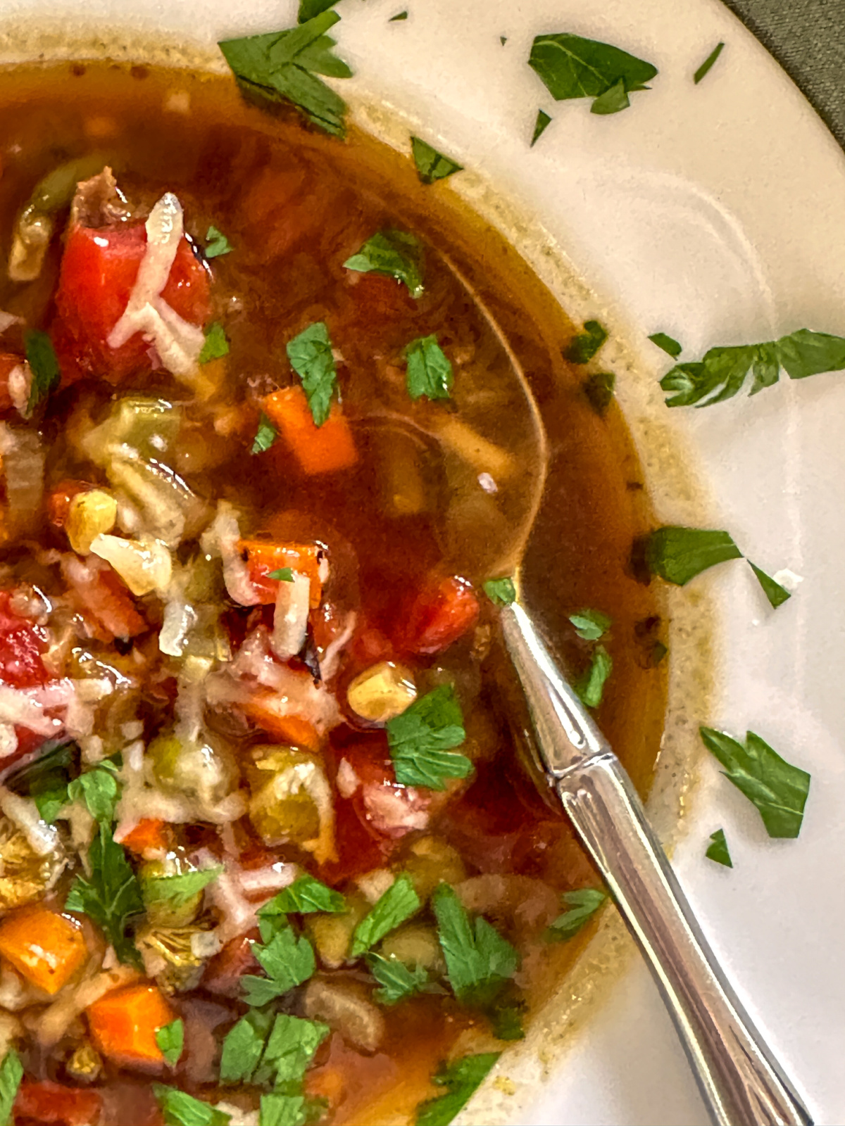 Overhead image of bowl of vegetable been soup.