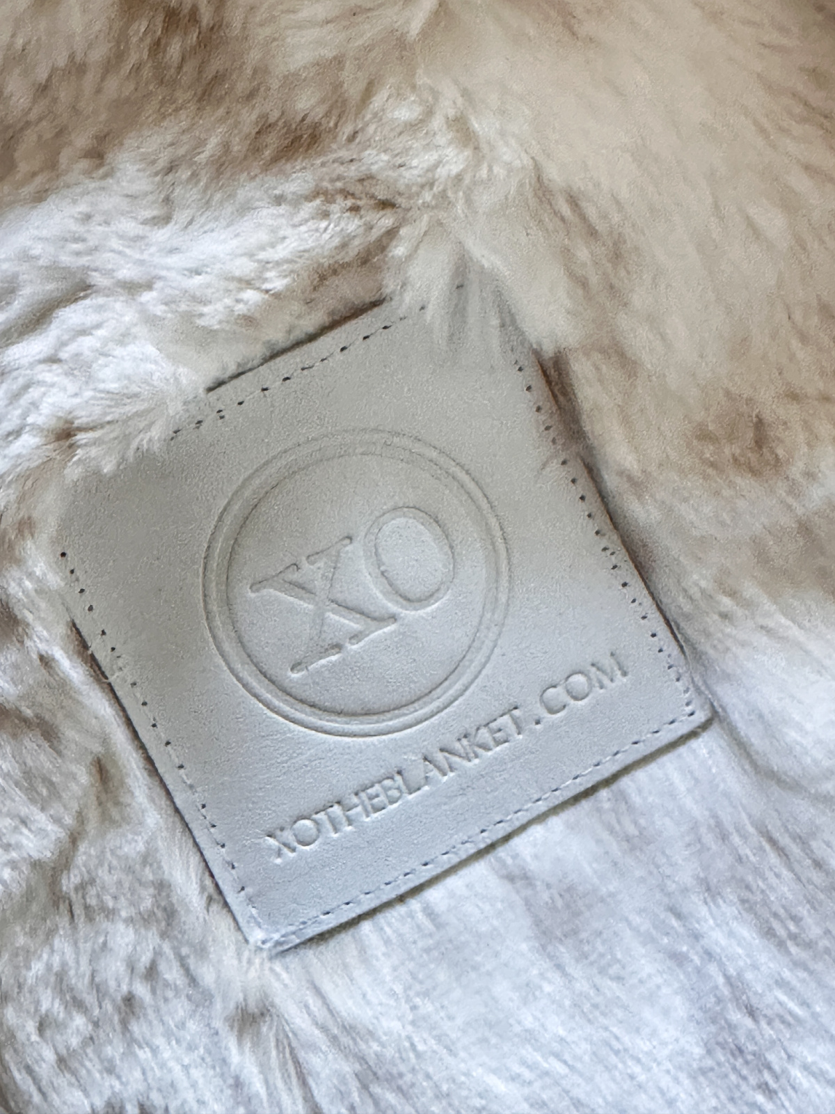 XO The Blanket label.