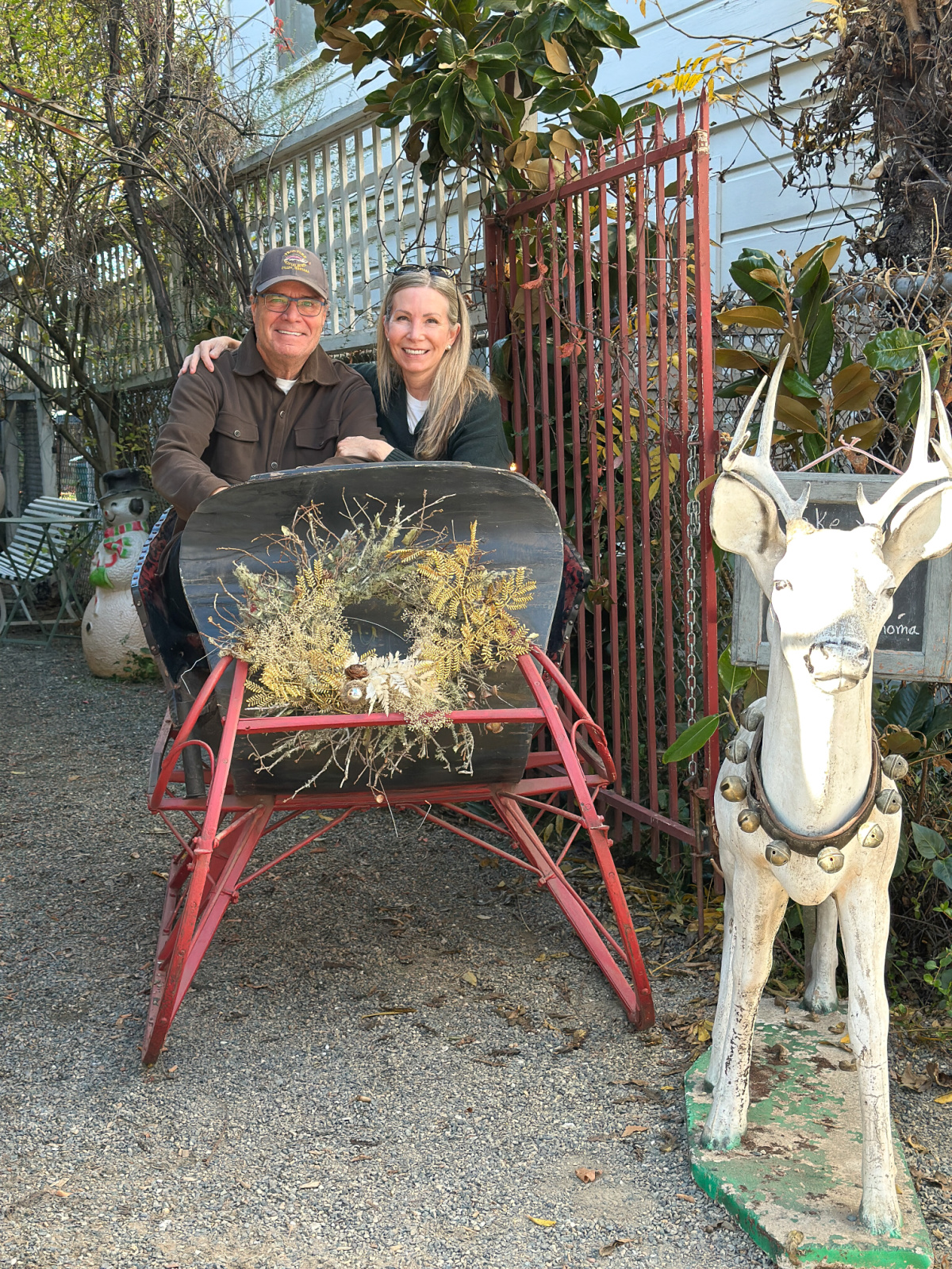 Couple in vintage sleigh.