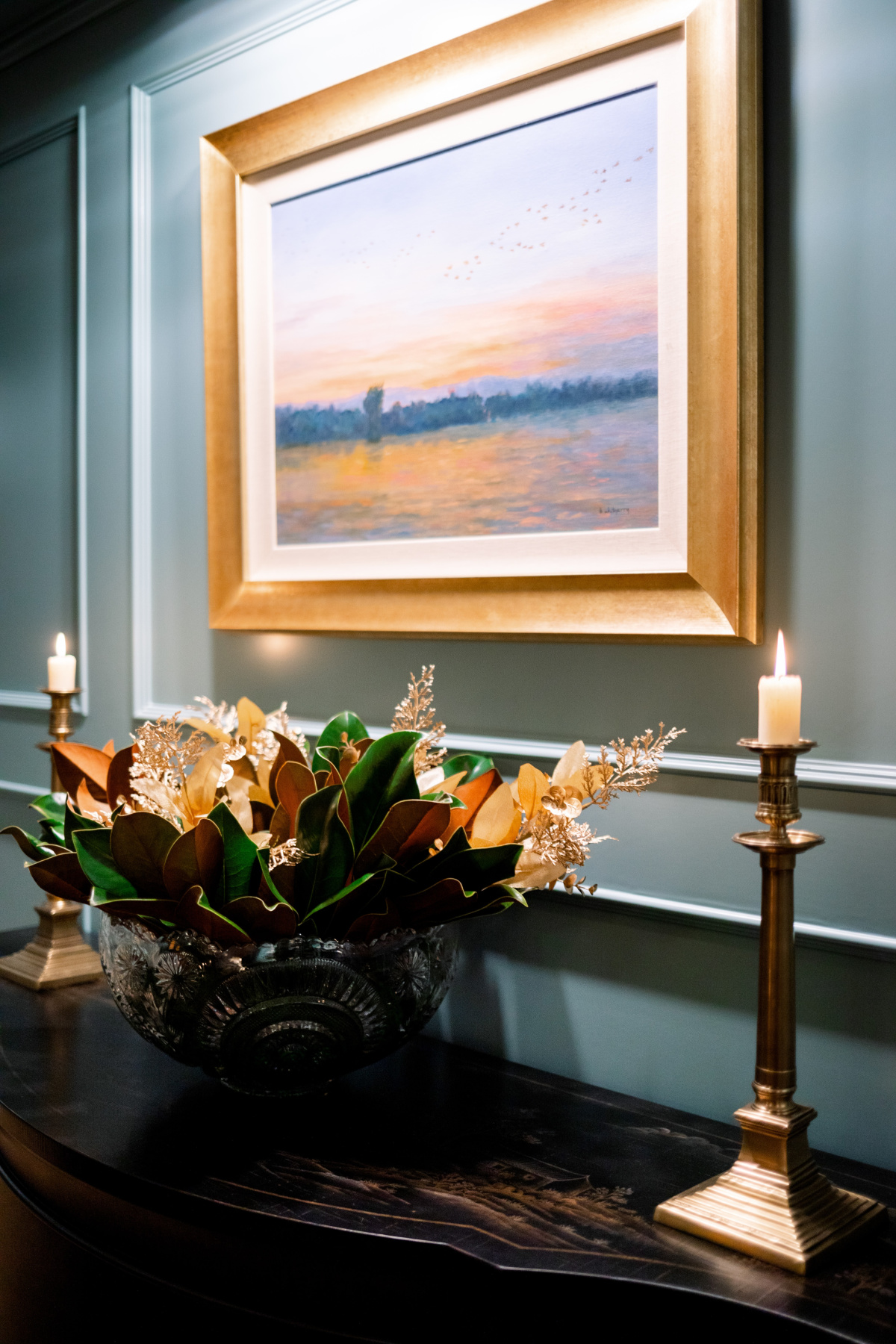 Punch bowl filled with magnolia leaves for the holidays.