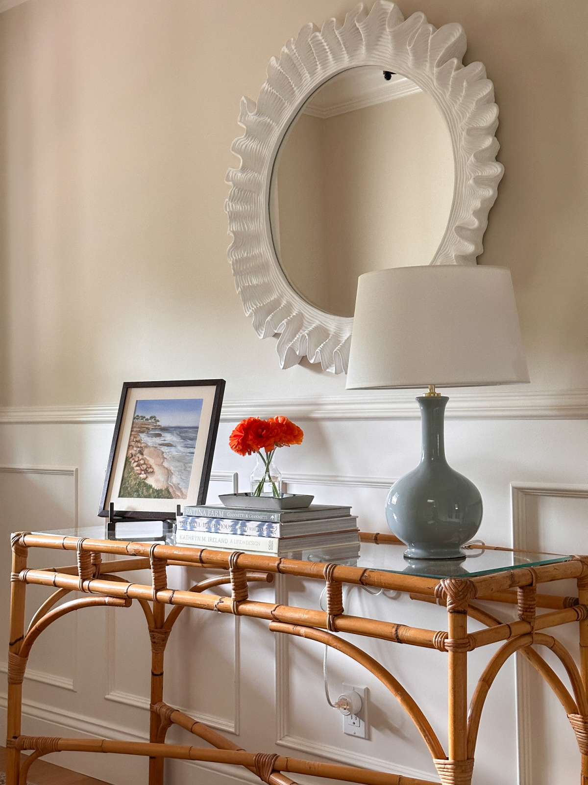 Bamboo console table in foyer.