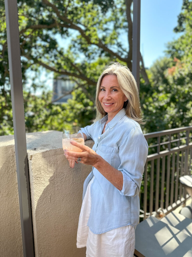 Woman holding Grapefruit Tequila Spritz.