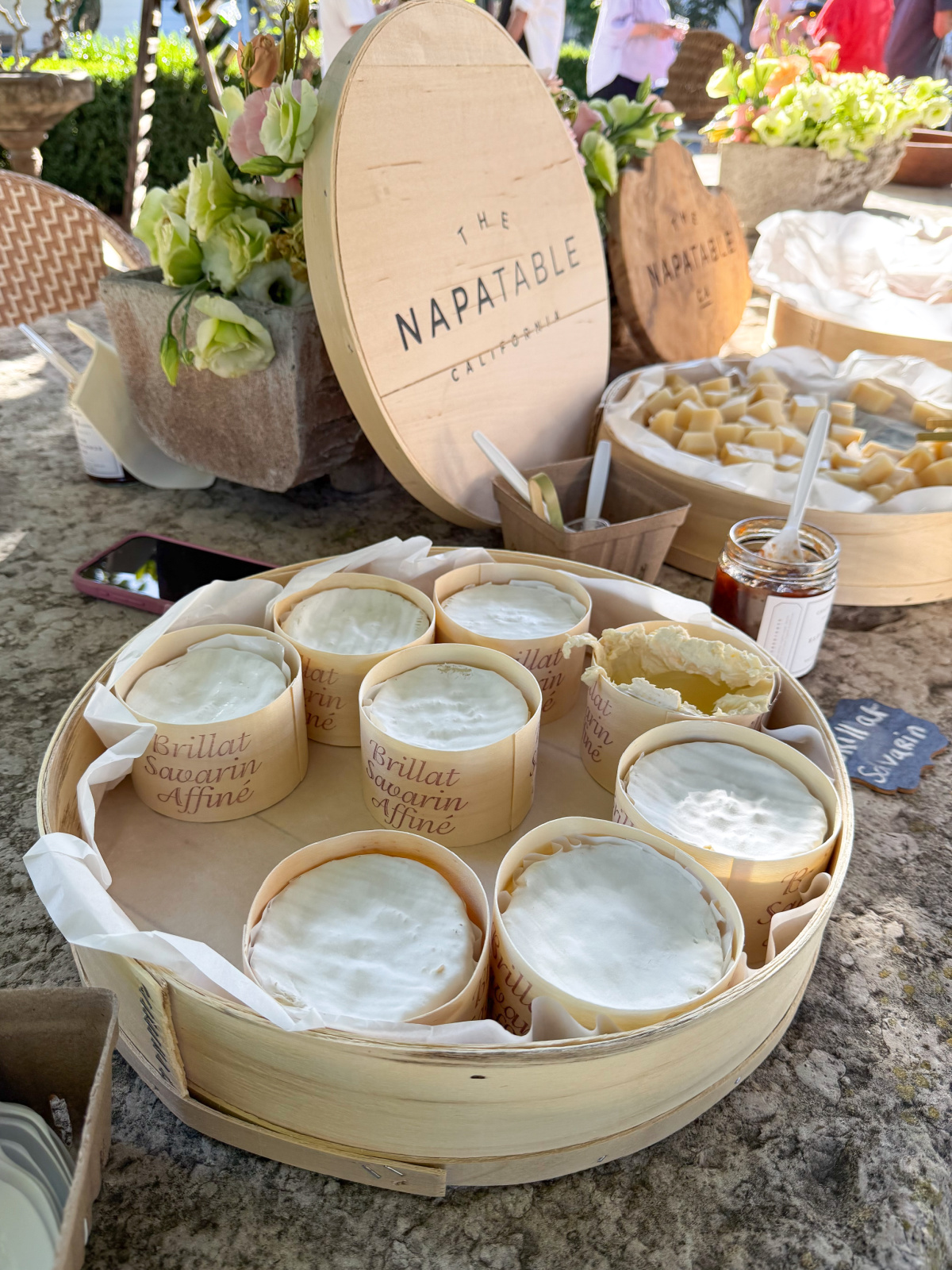 Tray of Brilat Savarin cheese on a charcuterie buffet.