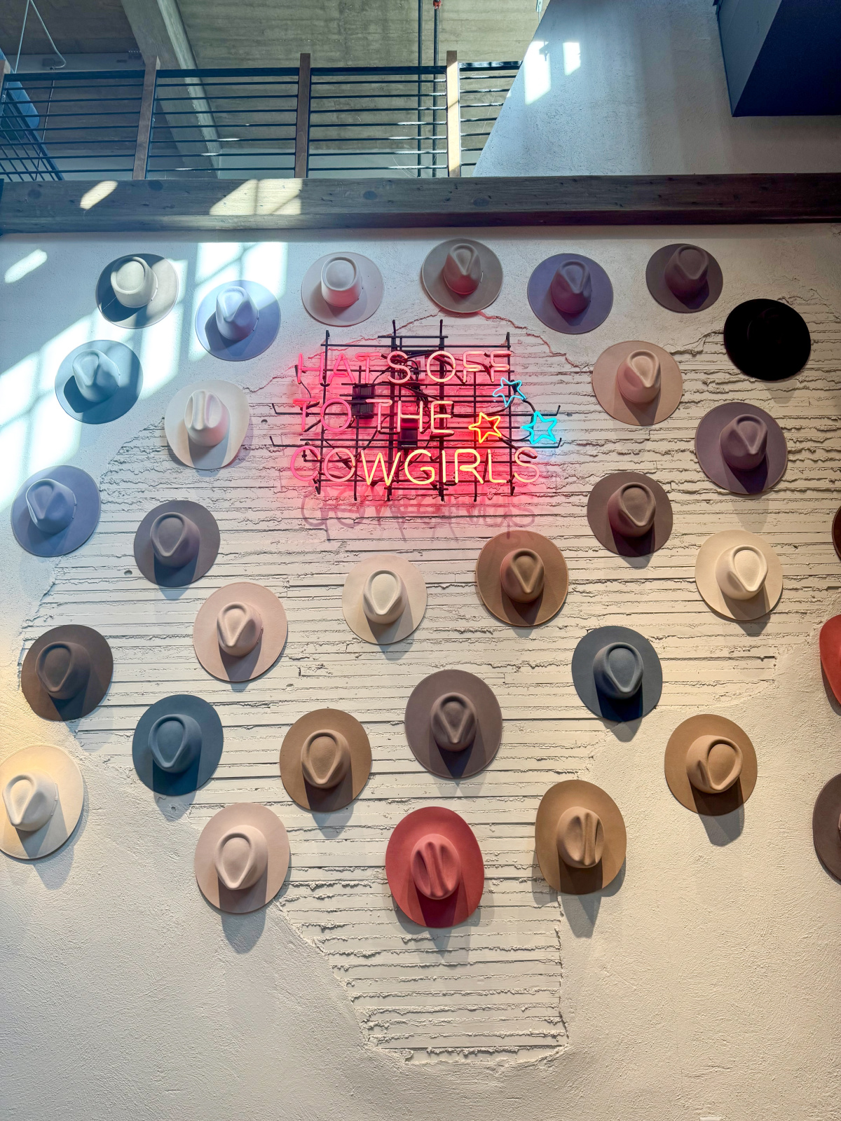 Wall of cowgirl hats in Ft. Worth.