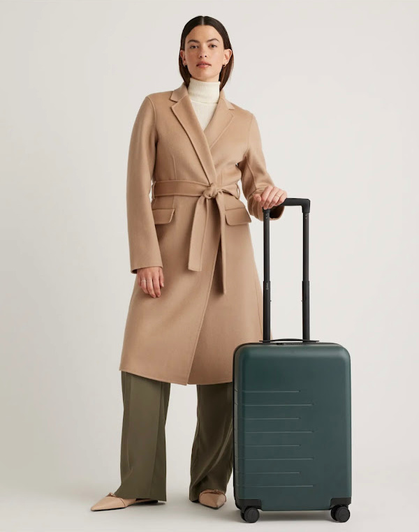 Quince expandable carry-on brand photo.
