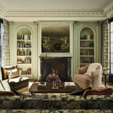The family room features moldings by Huh and Hyde Park mouldings and a custom Portoro marble mantel designed by Huh and fabricated by Ciot. Photography by Frank Francis.