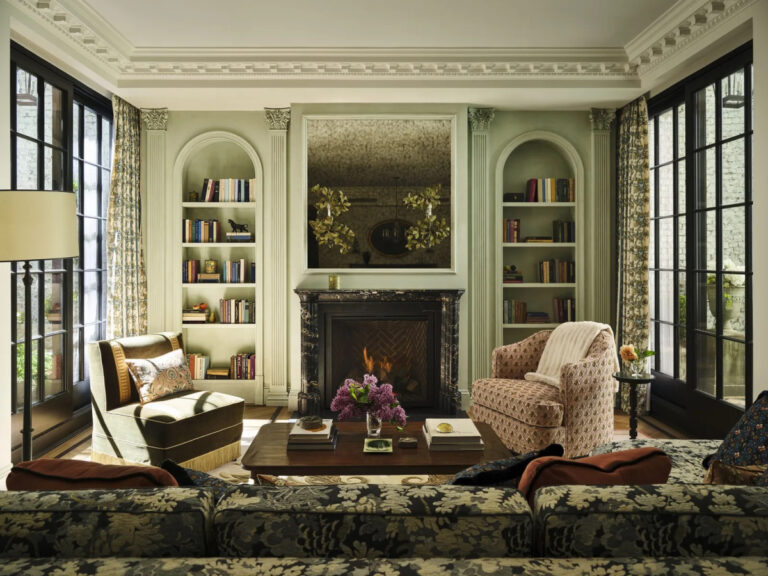 The family room features moldings by Huh and Hyde Park mouldings and a custom Portoro marble mantel designed by Huh and fabricated by Ciot. Photography by Frank Francis.