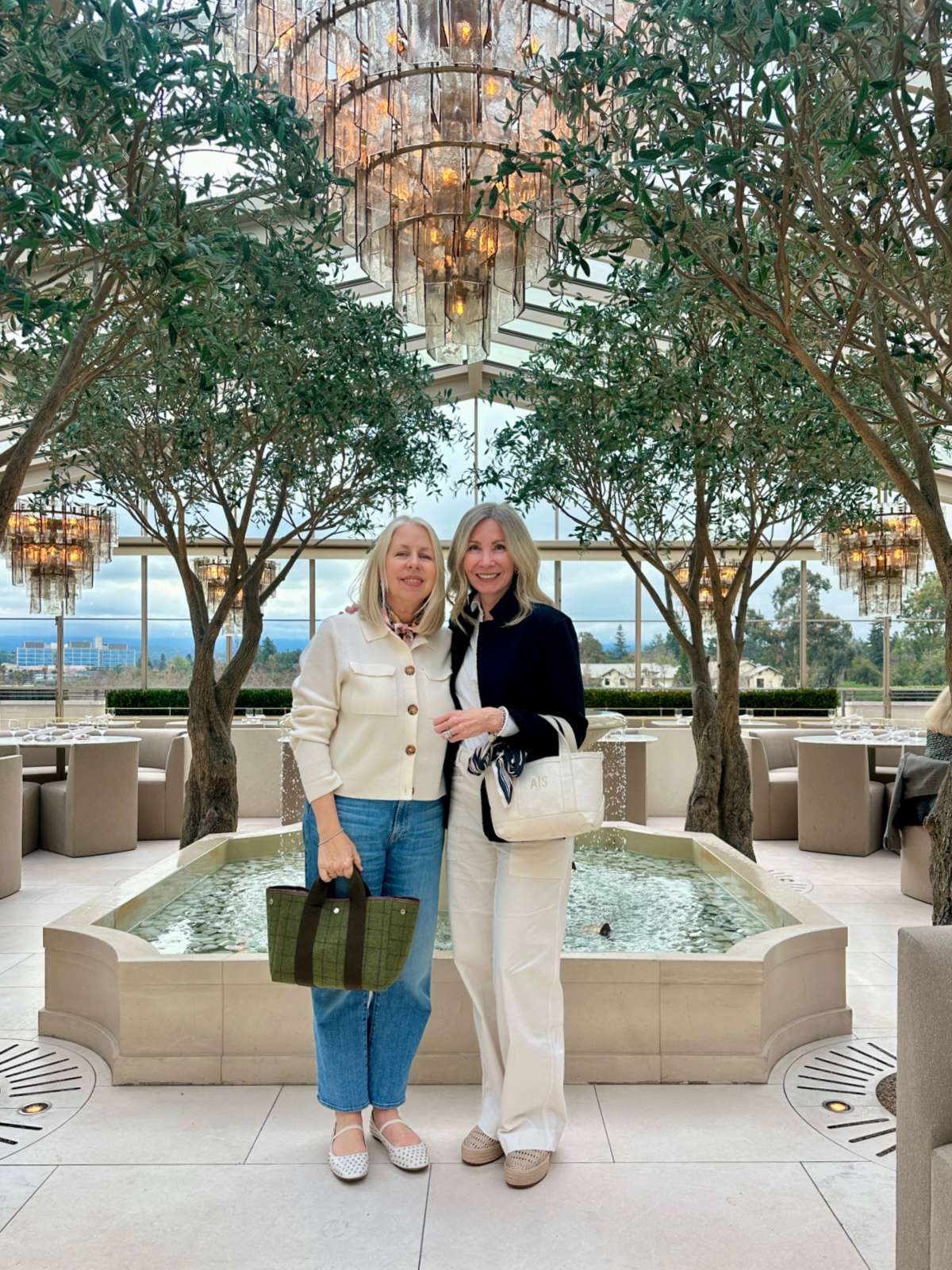 Two women standing on the RH rooftop patio in Palo Alto.